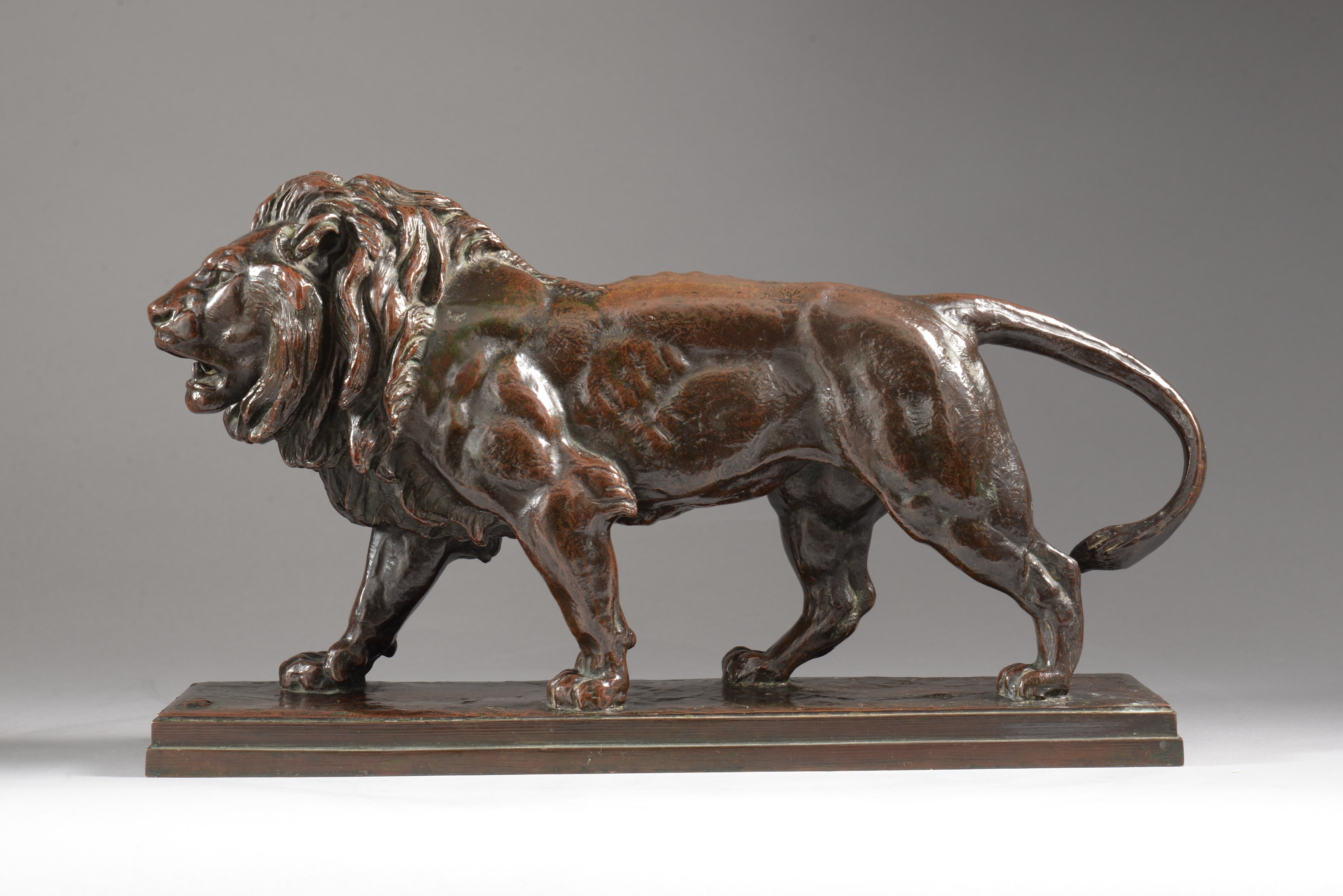 LION QUI MARCHE sur plinthe (1841)